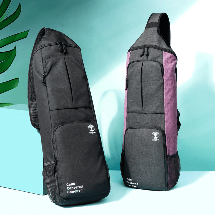 Two Warrior2 backpack yoga mat bags standing upright on display—one in black and one in purple-accented design, front-facing view.