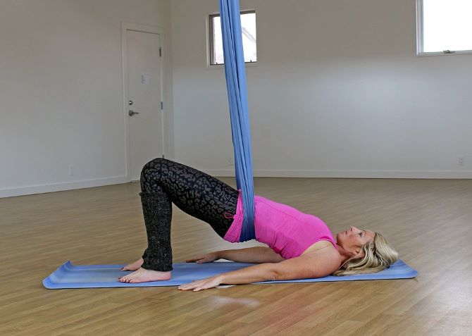 Benefits Of Restorative Aerial Yoga & 10 Aerial Yoga Poses For Stress Relief