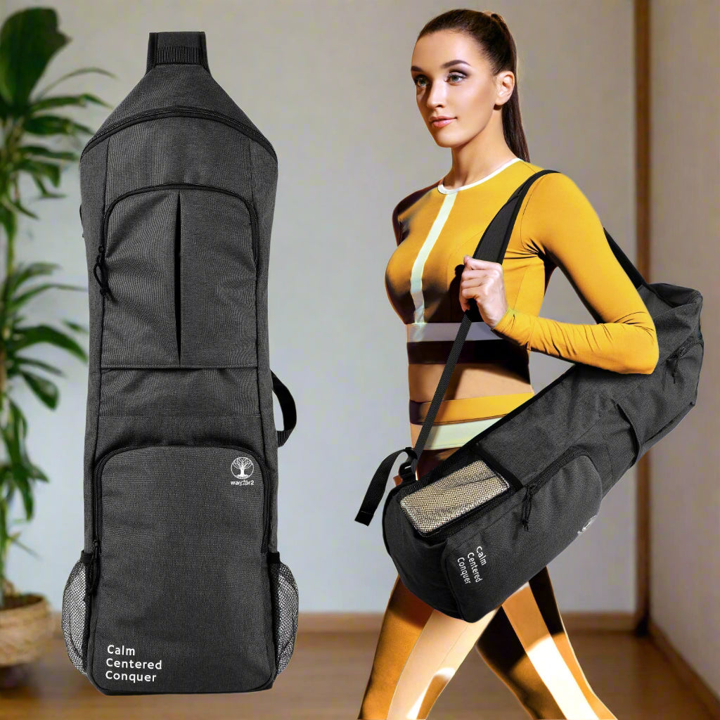 warrior2 black yoga mat bag with a woman holding it in a yoga studio