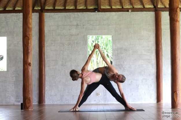 side to side triangle pose for two person yoga