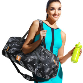 smiley girl active ware aqua blue outfit carrying warrior2 yoga gym bag