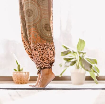 woman standing on tip of feet what to expect after yin yoga