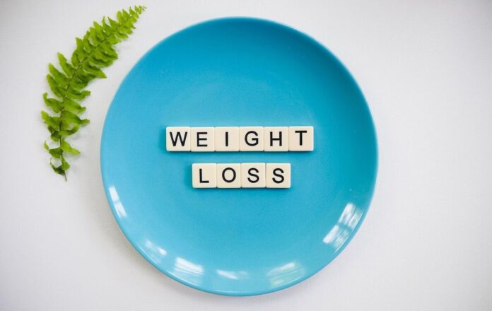 blue plate on white background text blocks weight loss