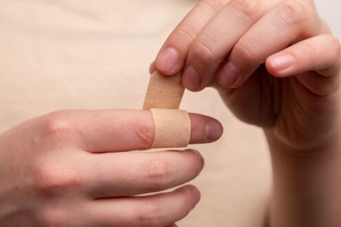 person wrap bandage finger injury aerial yoga