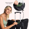 girl smiling putting warrior2 black yoga work tote on a carry on luggage